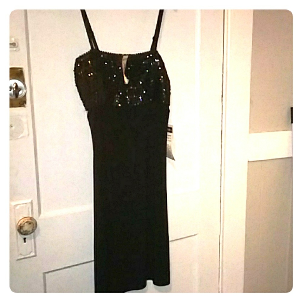 Shift dress with sequins.